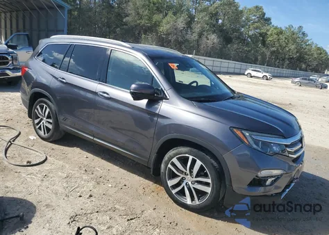 2018 Honda Pilot Touring z USA, uszkodzony, nr VIN 5FNYF5H98JB013874